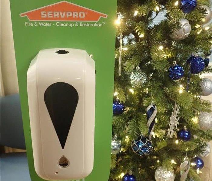 CHRISTMAS tree and SERVPRO sanitizer